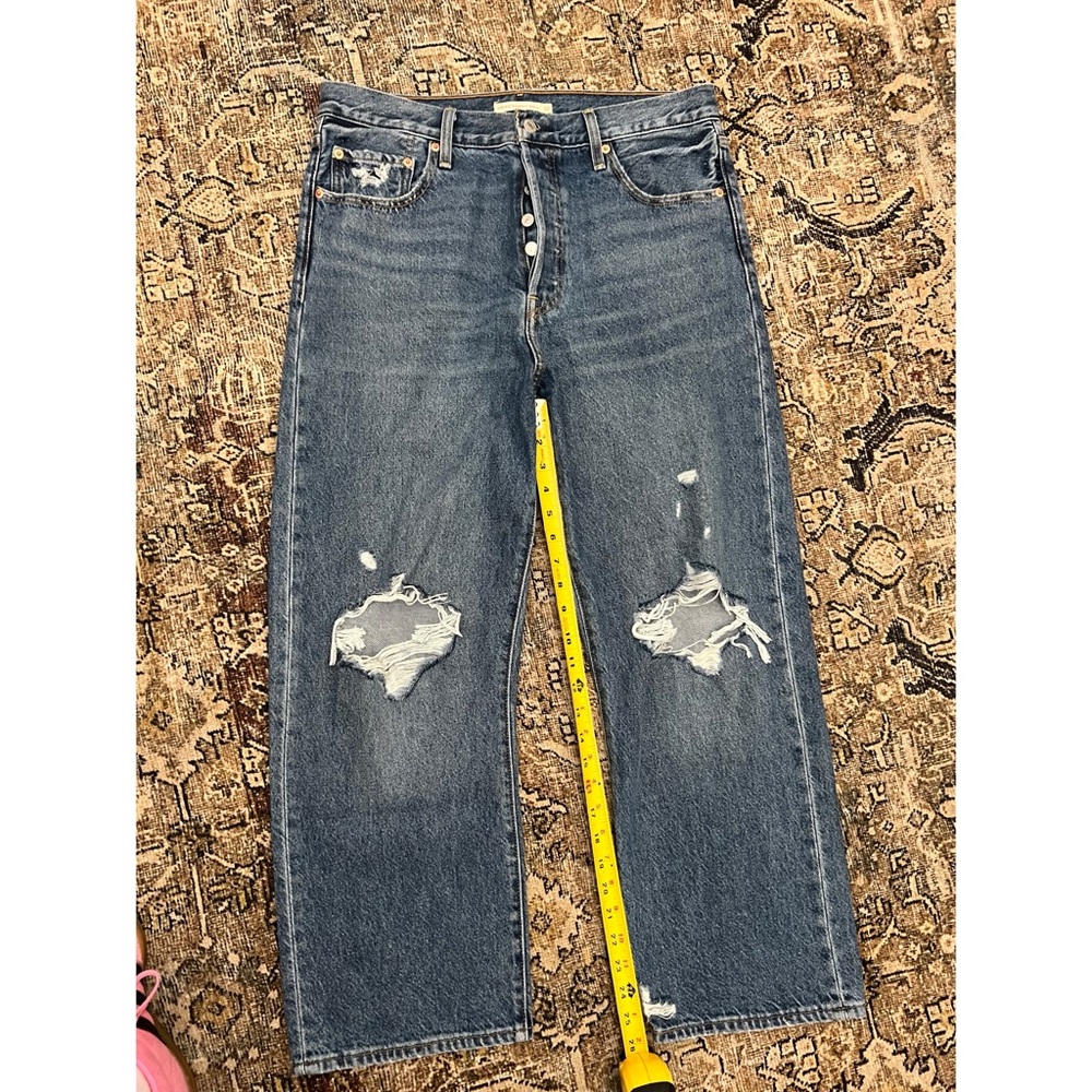 Women’s Levi brand  Blue Distressed Jeans